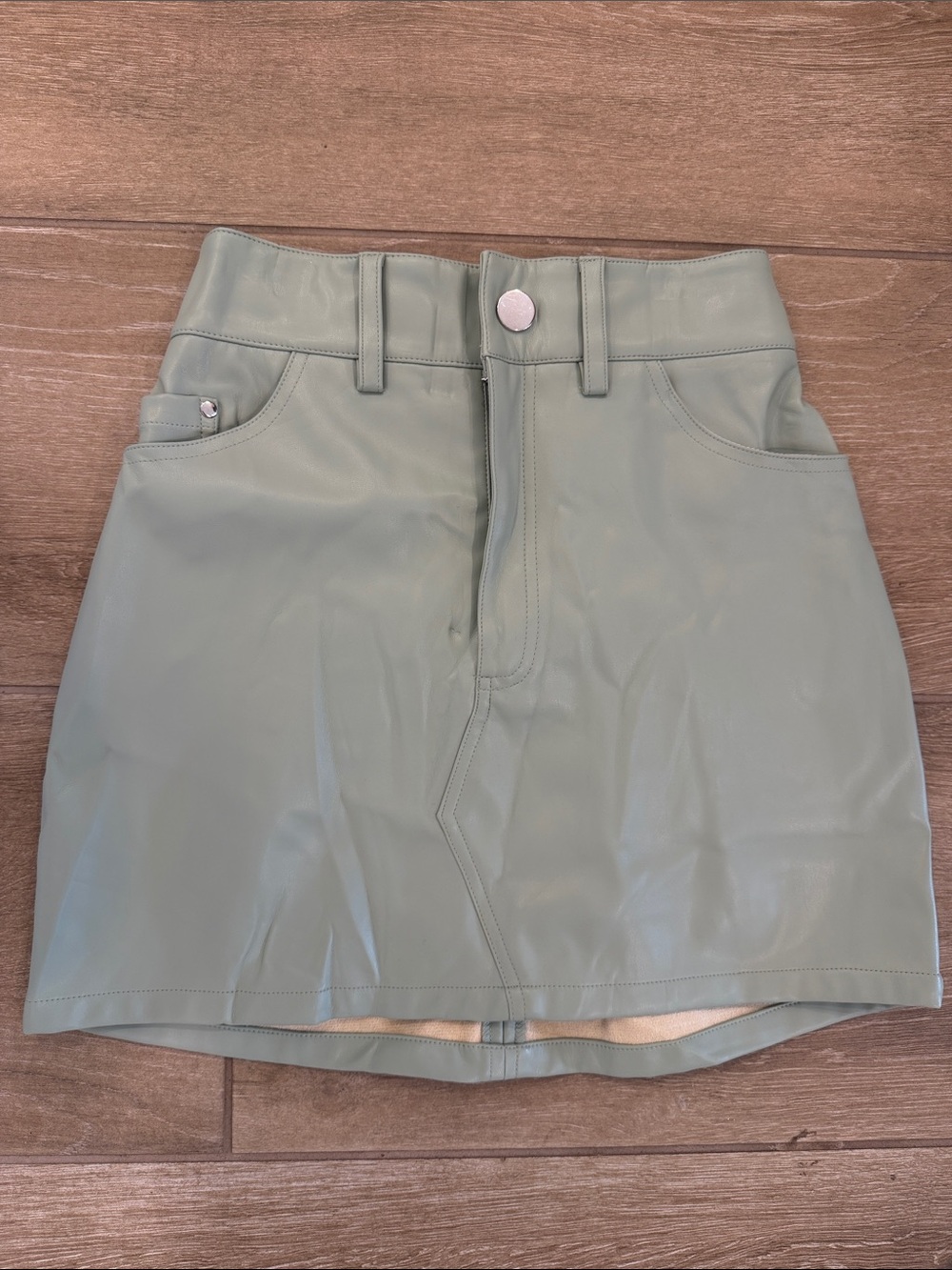 Central Park West Faux Leather Mini Skirt in Sage Green
